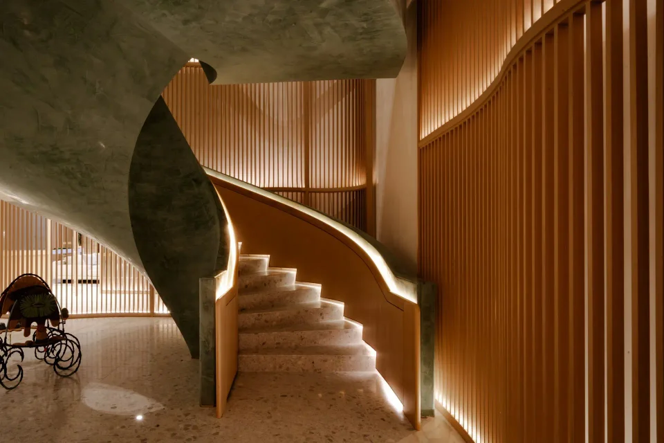 Completed staircase and curved railing in the interior