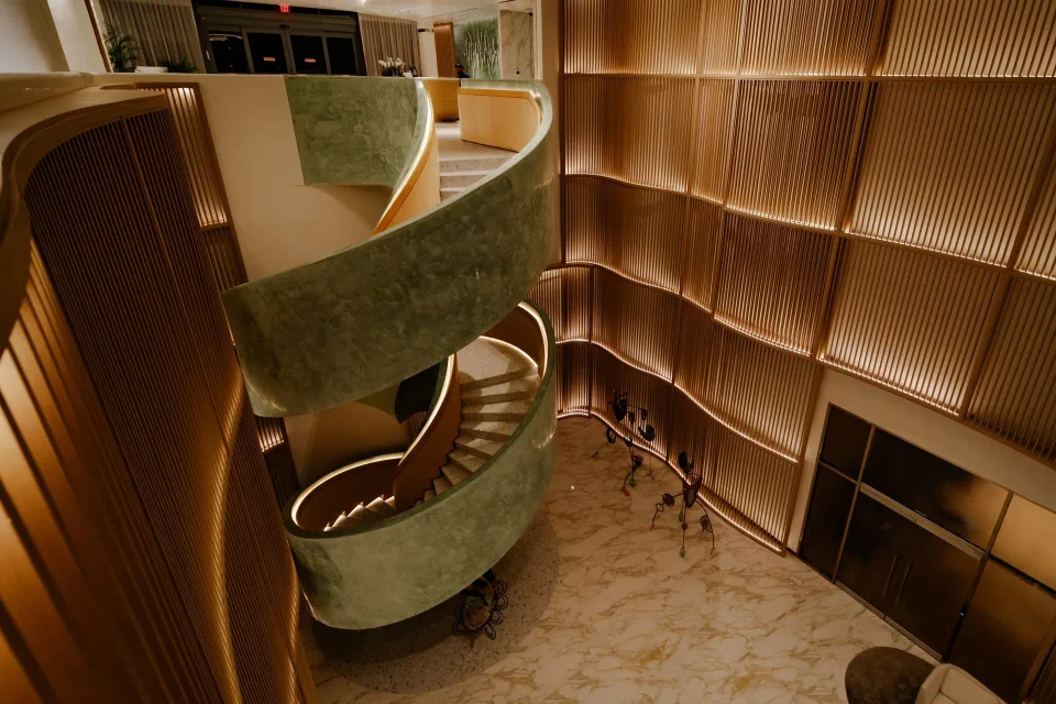 Completed stair assembly and surrounding finishes
