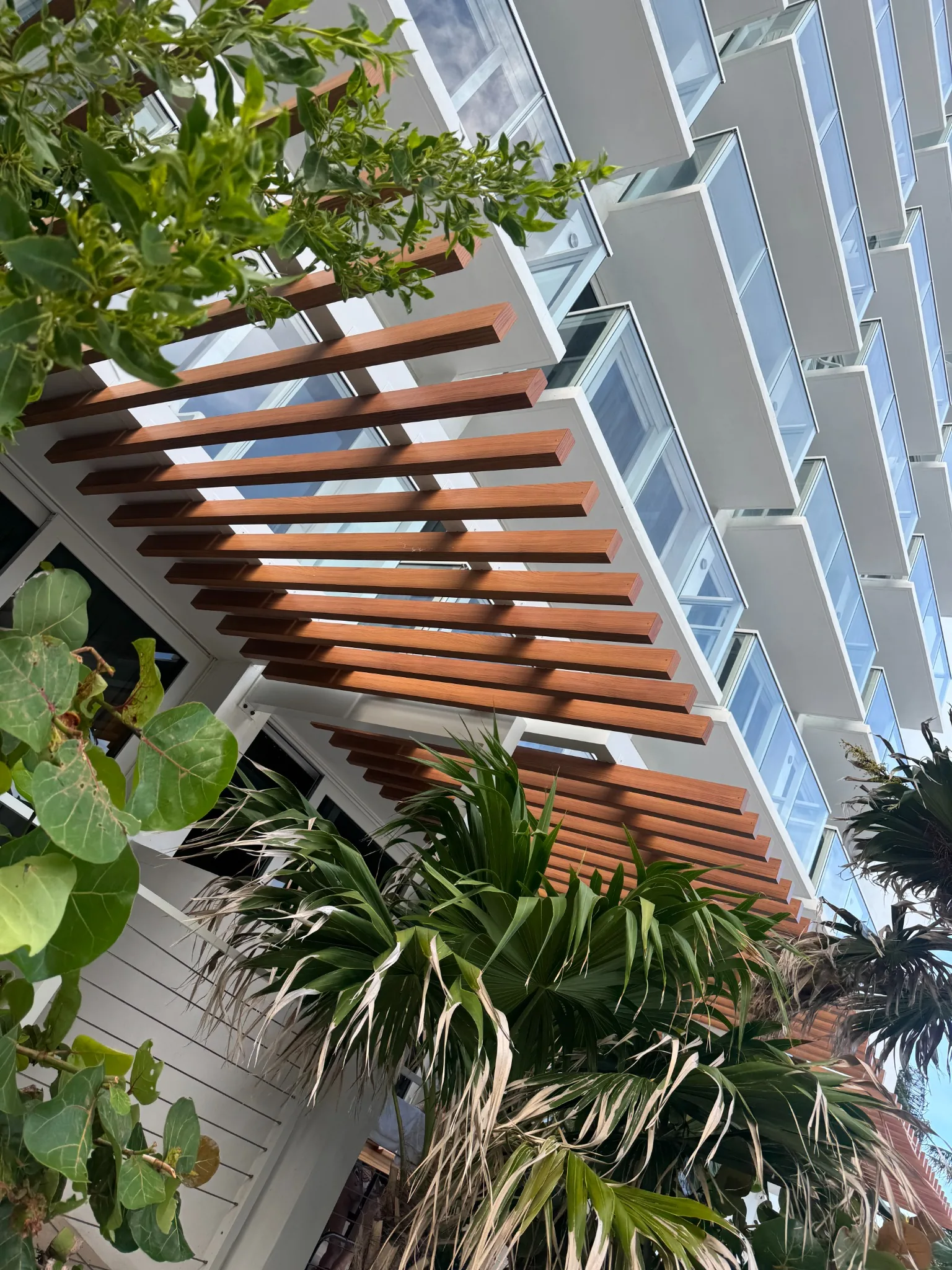 Spiral staircases, structural metal deck, and cable railings - Newport Beachside Resort gallery