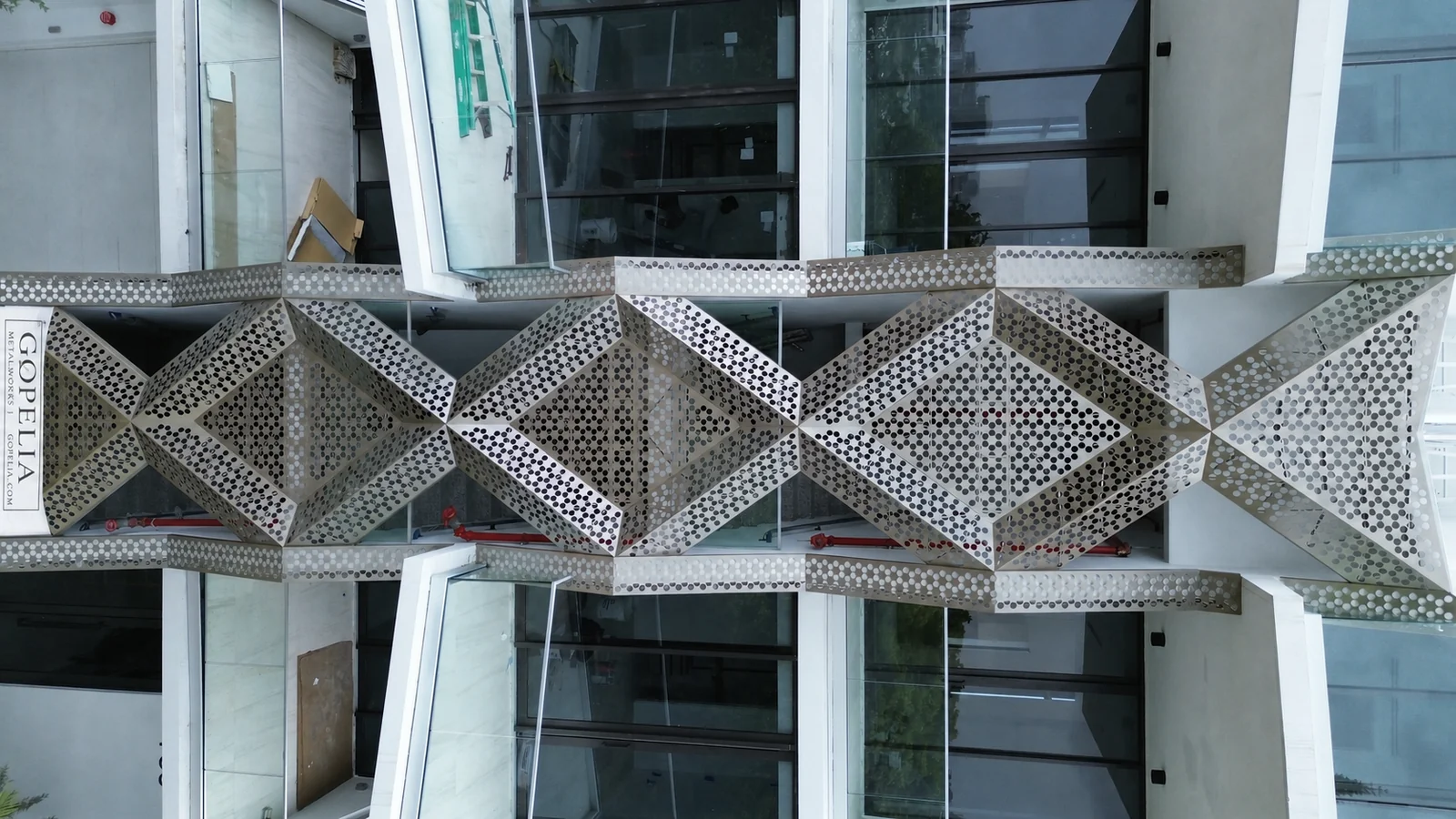 Perforated aluminum diamond screen facade side elevation - 756 84 St Residences, Miami Beach FL