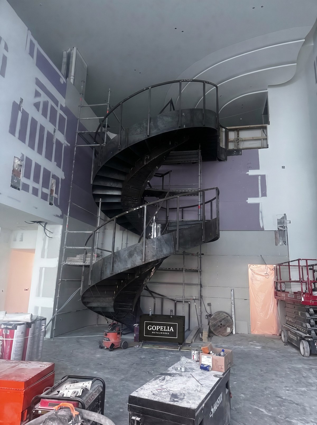 GOPELIA Metalworks custom spiral staircase steel fabrication in progress - Casamar Pompano Beach