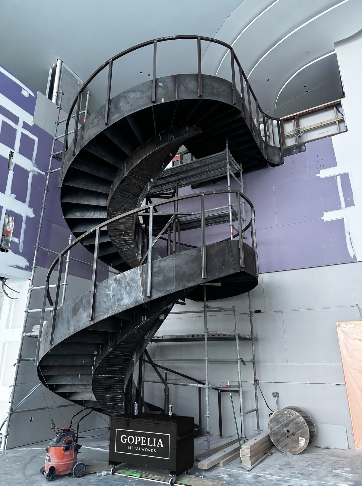 GOPELIA Metalworks fabricated steel spiral staircase centerpiece - Casamar Pompano Beach project