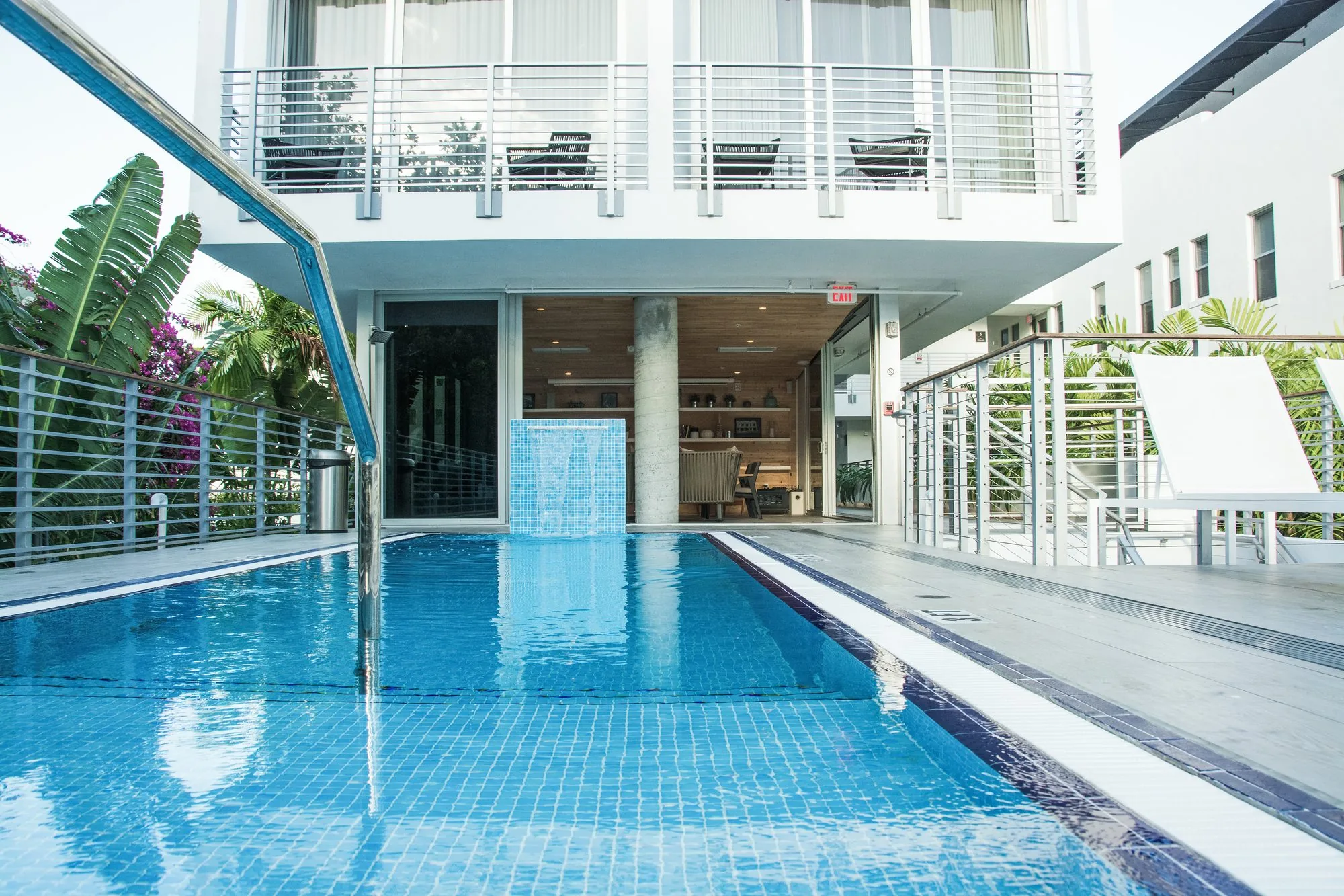 Pool deck with aluminum railings and balcony louvers - The Meridian Hotel, Miami Beach FL