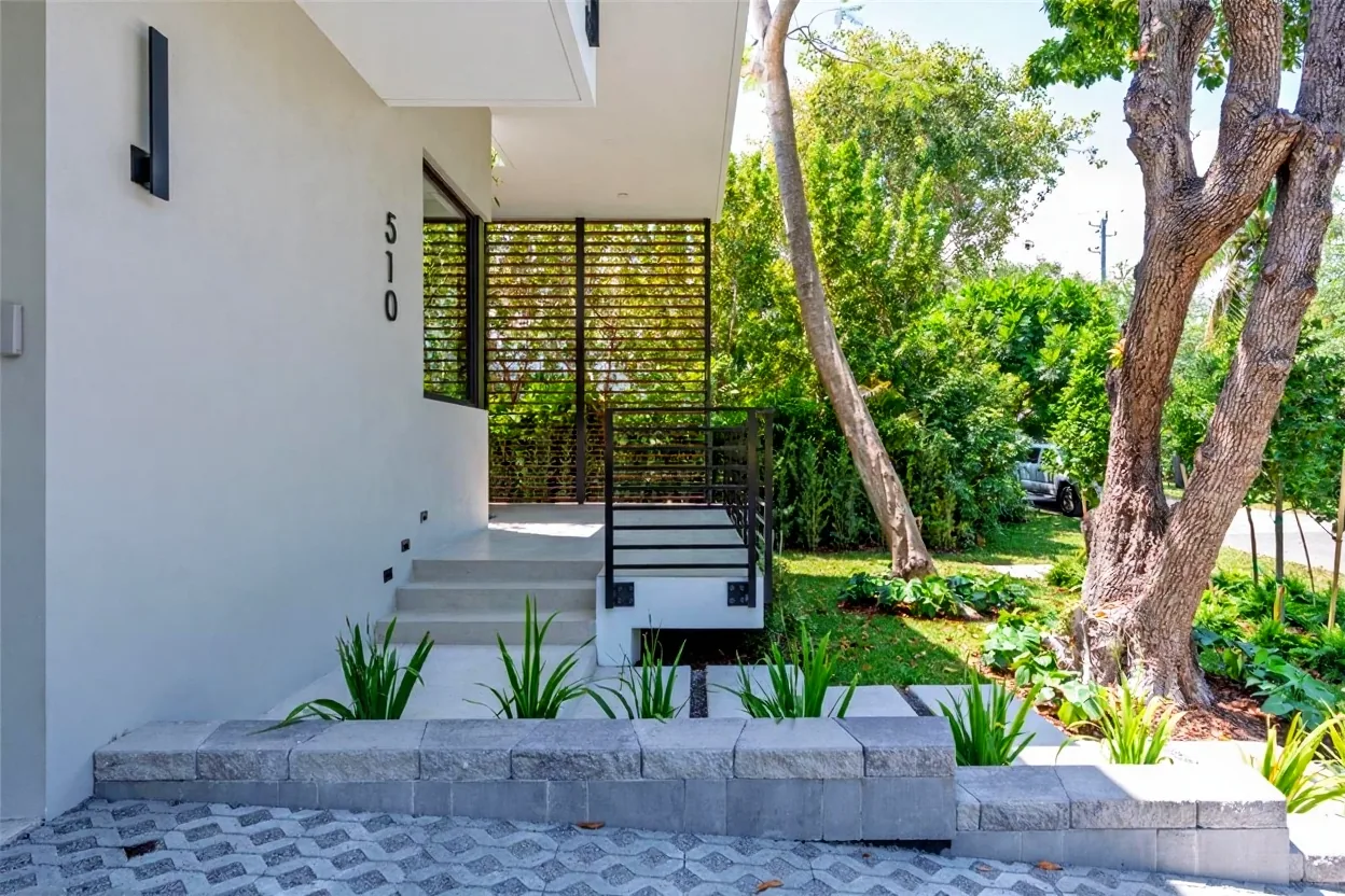 Custom staircase and faux wood aluminum louvers - Morningside Residence gallery