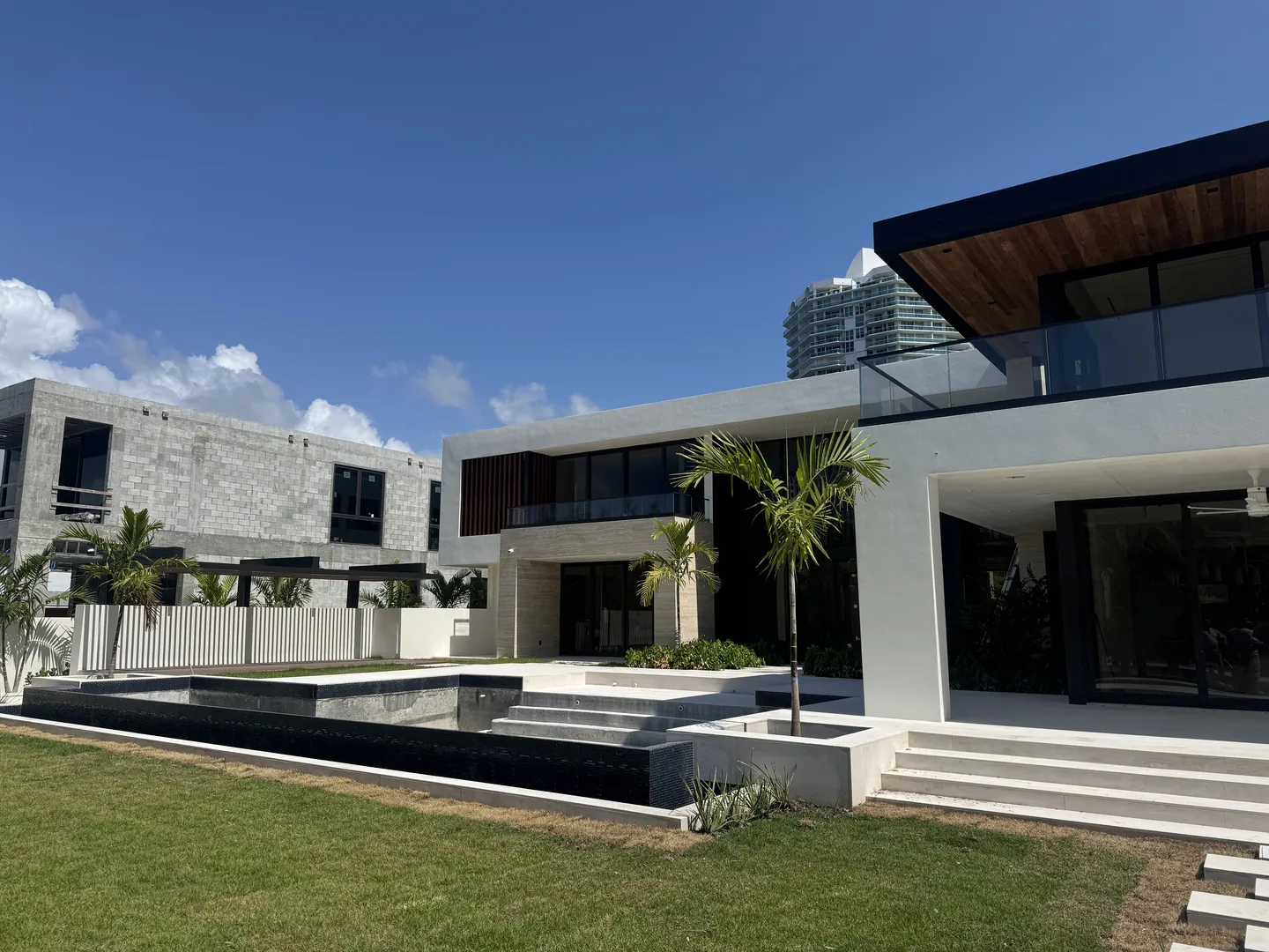 Rear elevation with reflecting pool and glass railings - Atlantic Ave Residence gallery