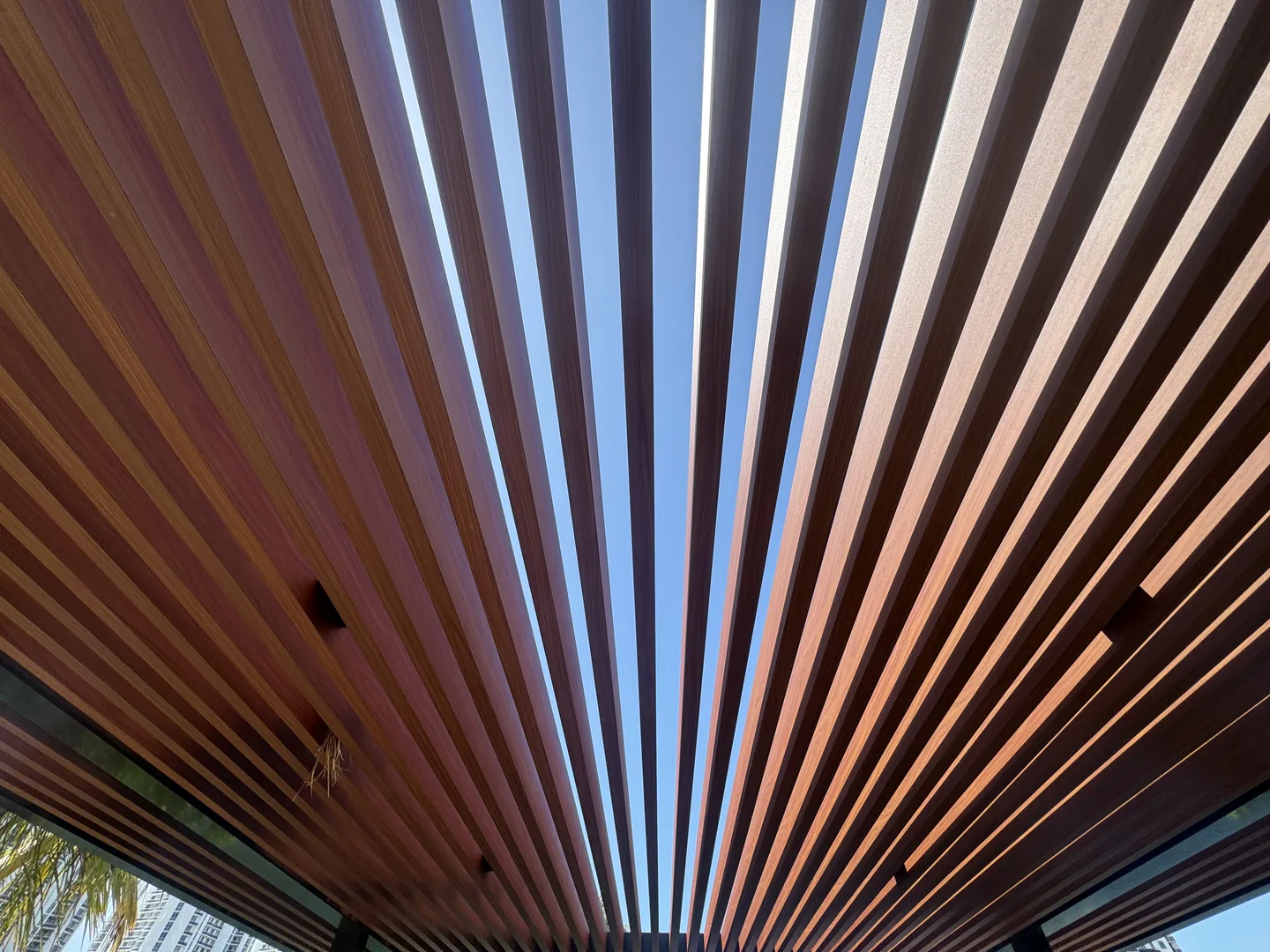 Faux-wood aluminum slat detail open to the sky - Atlantic Ave Residence gallery