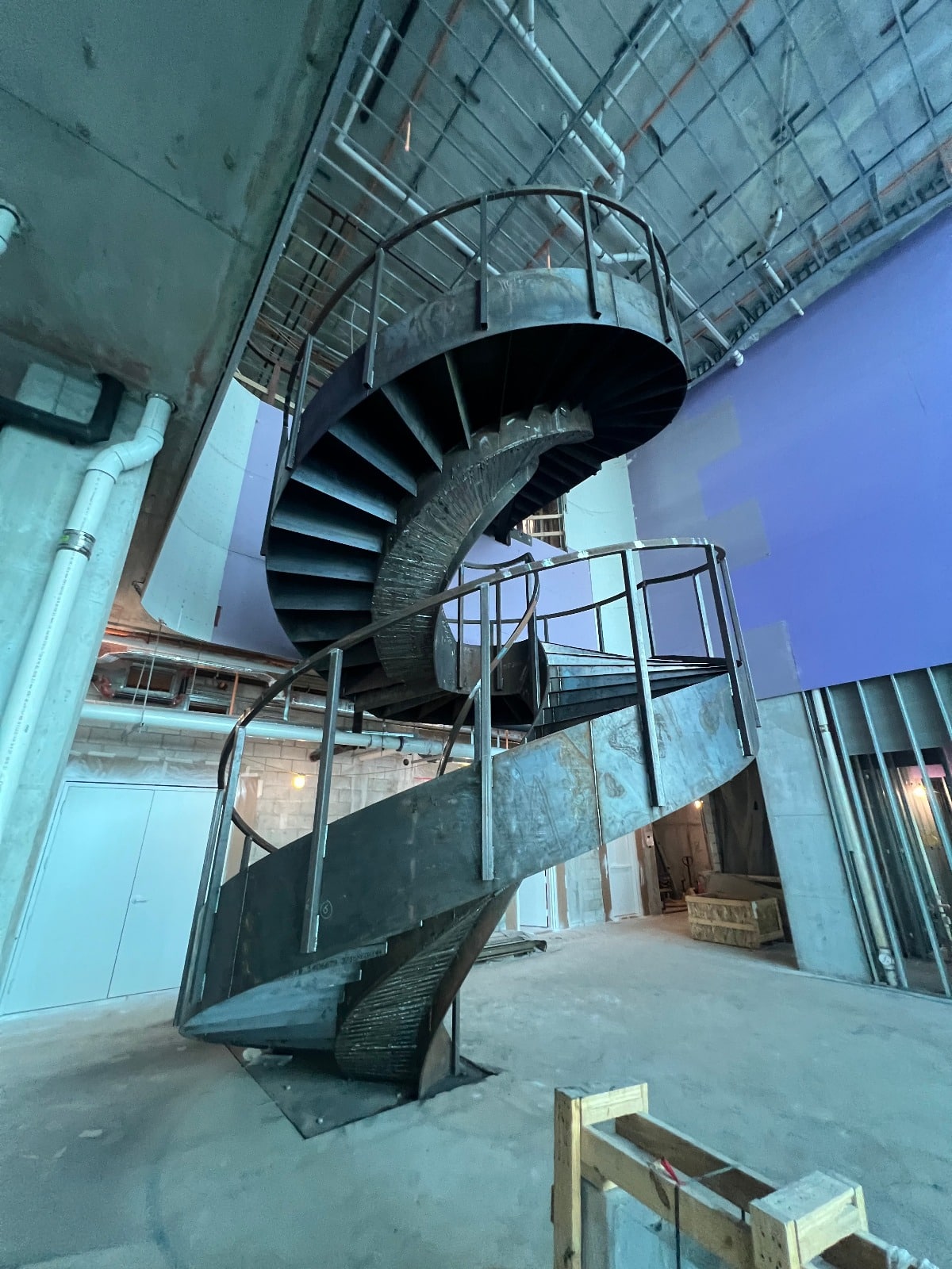 Elegant spiral staircase at Casamar, Pompano